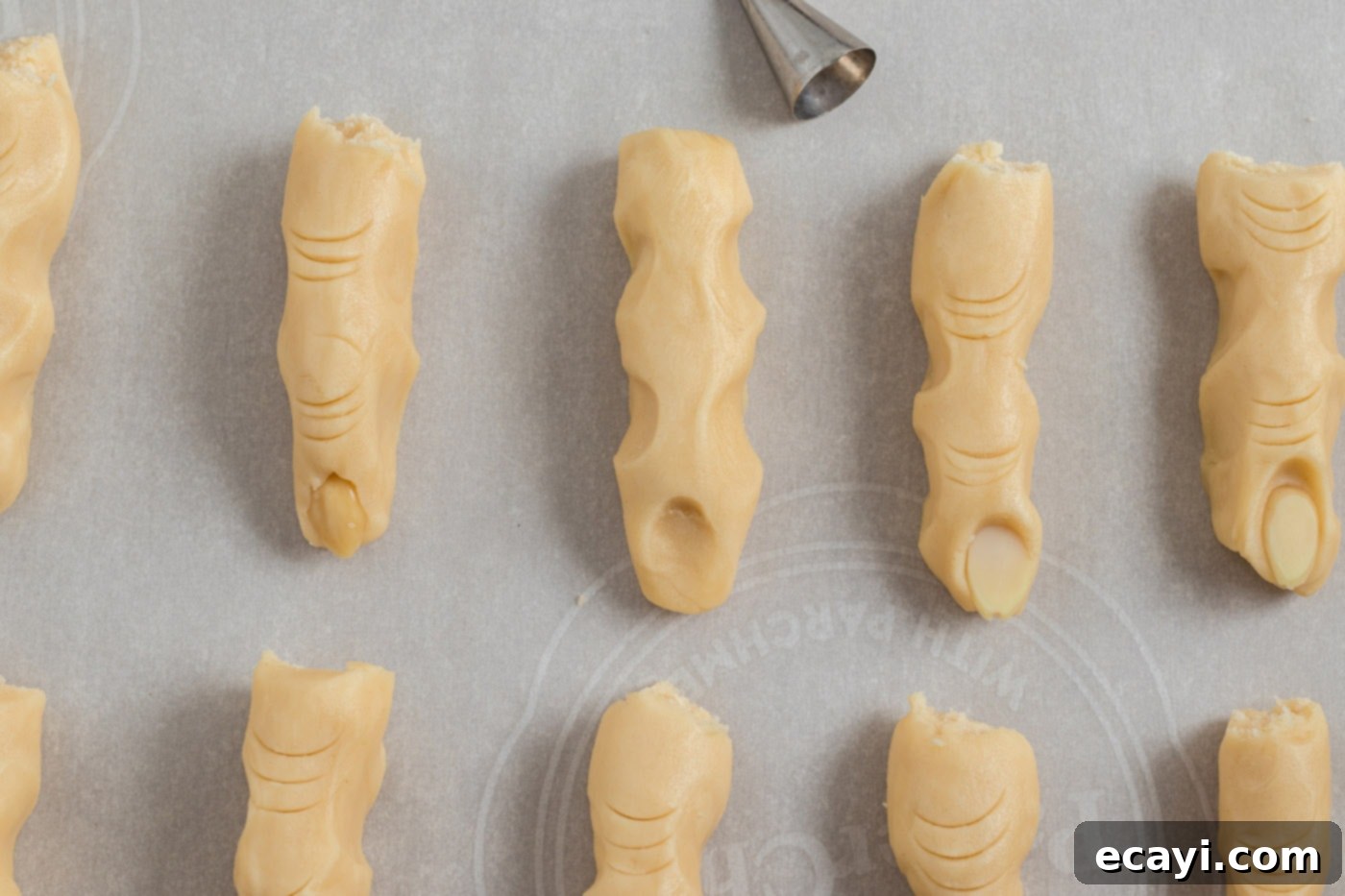 Wicked Fingers 11 Cookie dough with perfectly made fingernail indents, ready for sliced almonds to complete the Witch Finger look