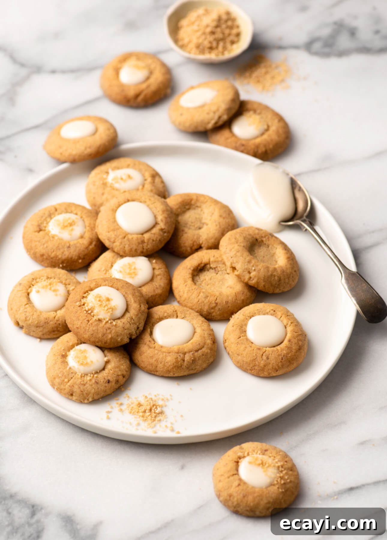 Golden Maple Pecan Indulgences 2 Maple and Pecan Thumbprint Cookies // FoodNouveau.com