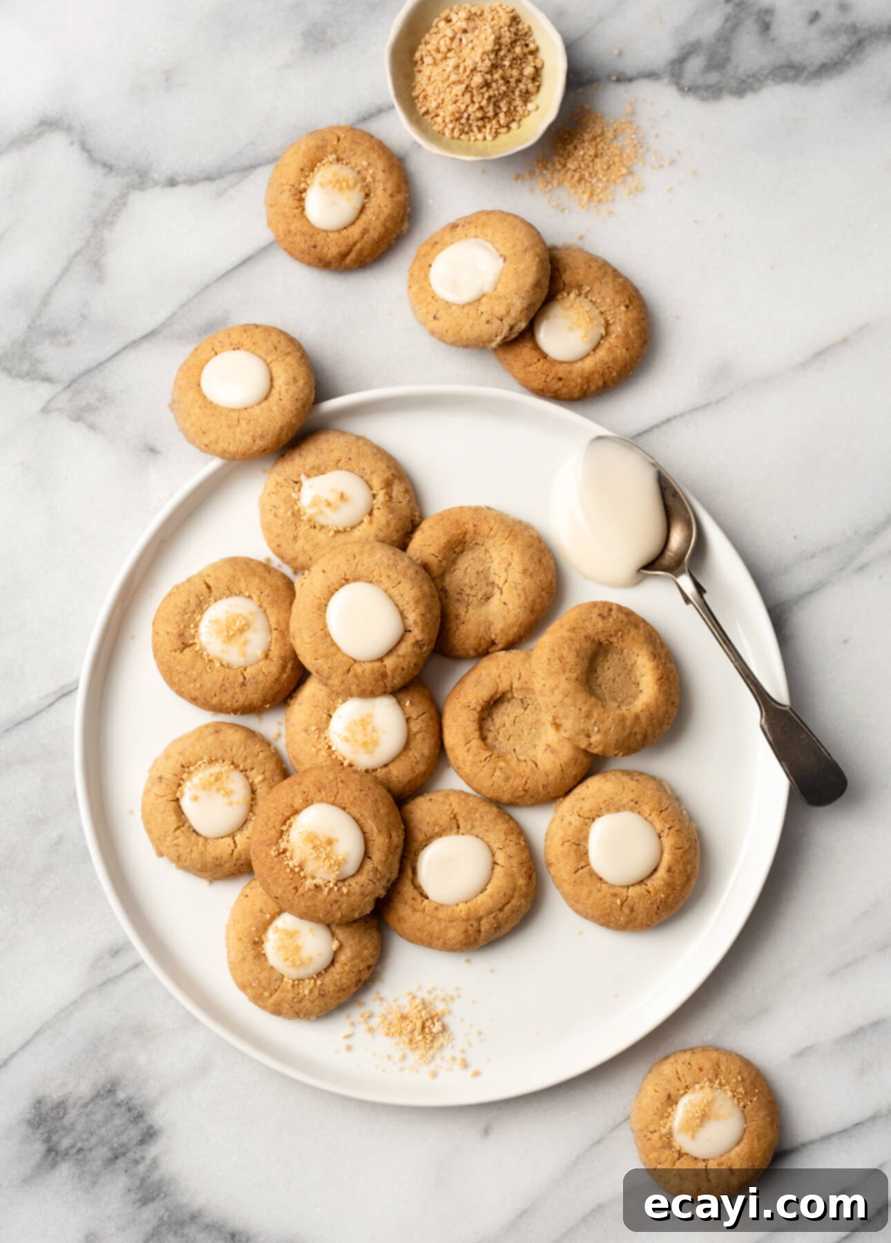 Golden Maple Pecan Indulgences 3 Maple and Pecan Thumbprint Cookies // FoodNouveau.com