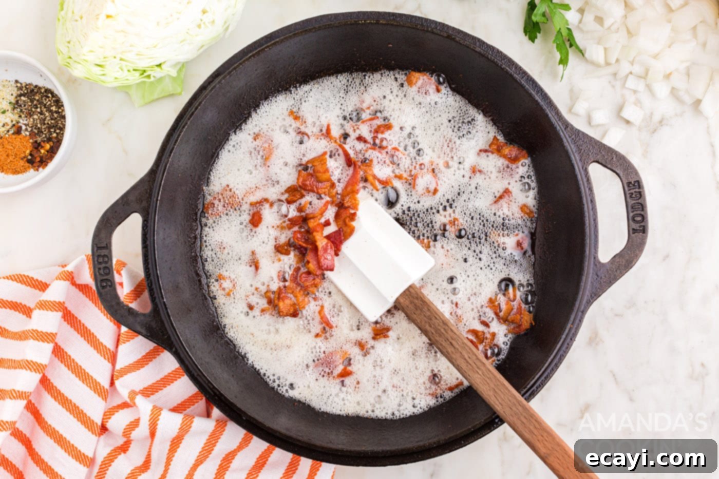Golden Fried Cabbage 5 frying bacon on a skillet