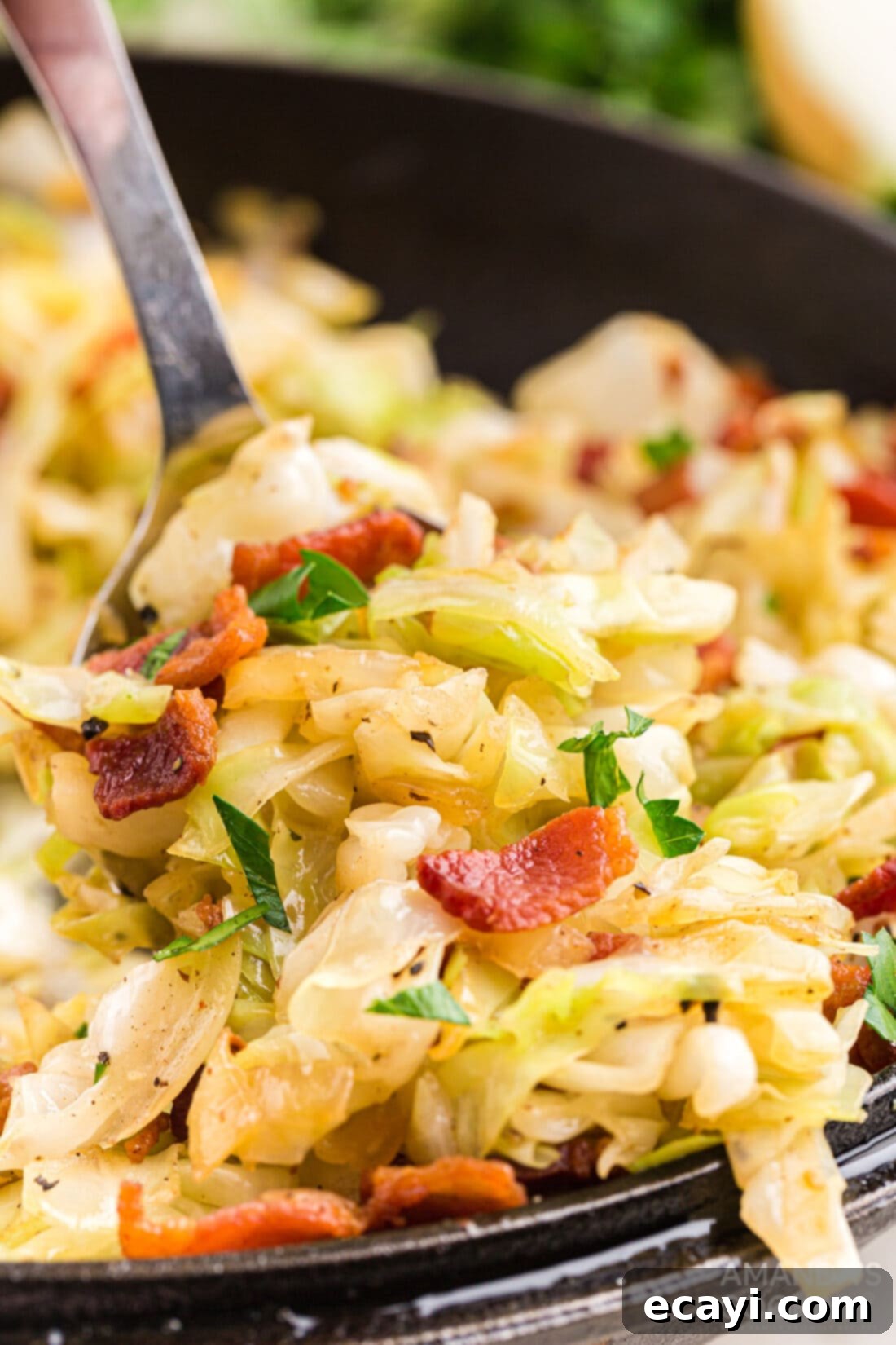 Golden Fried Cabbage 9 spooning out Fried Cabbage