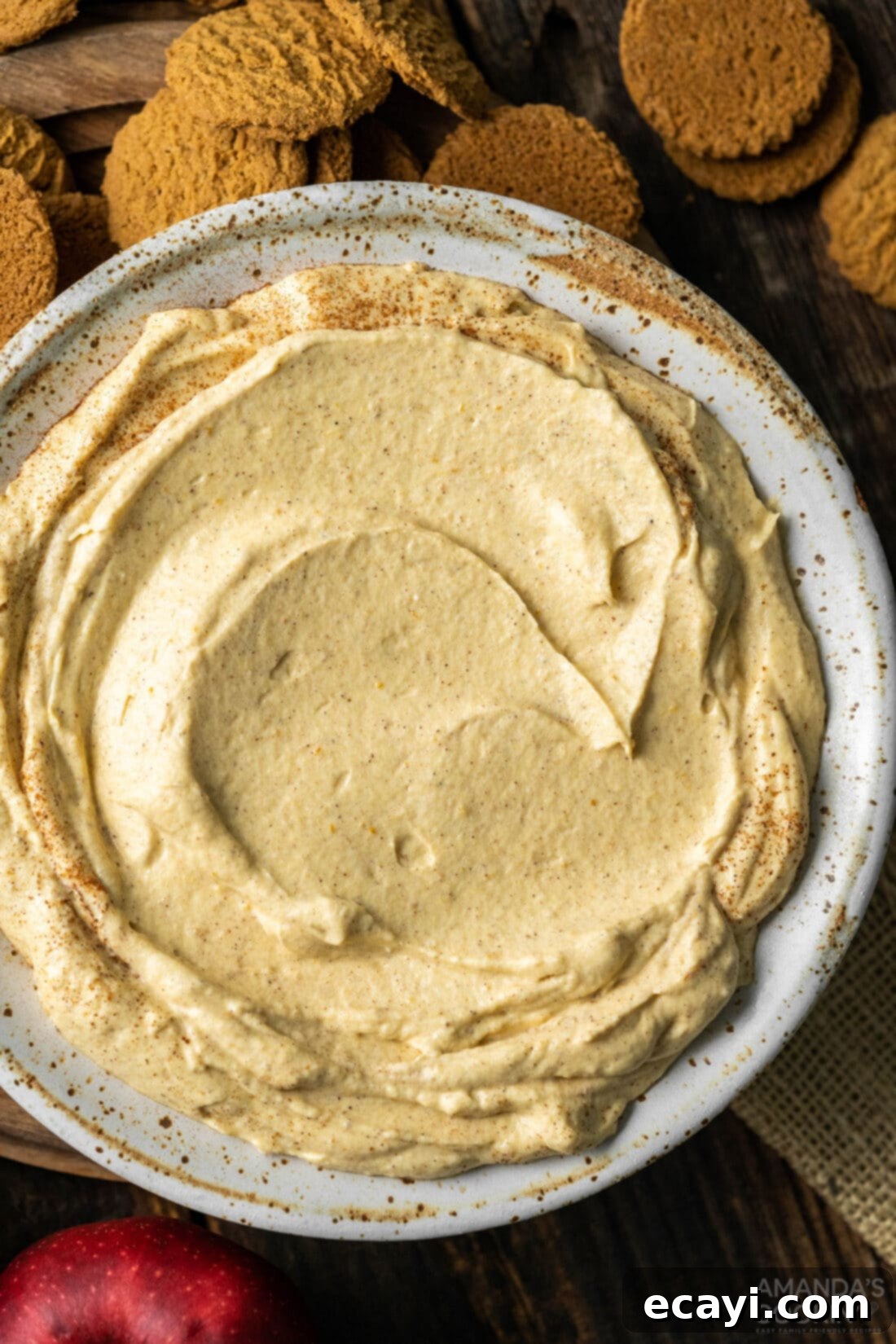 Spiced Pumpkin Pie Dip 11 overhead view of Pumpkin Pie Dip in a bowl with various dippers