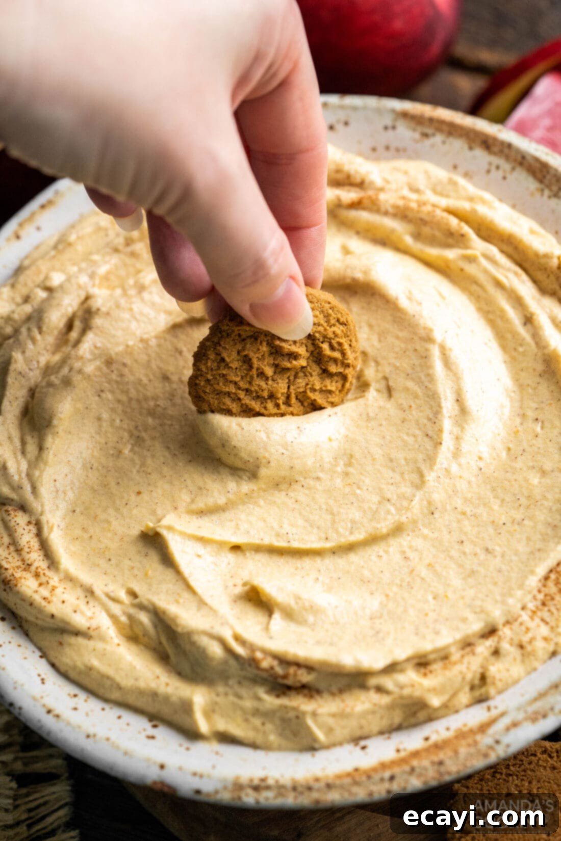 Spiced Pumpkin Pie Dip 3 dipping cookie into fluffy Pumpkin Pie Dip