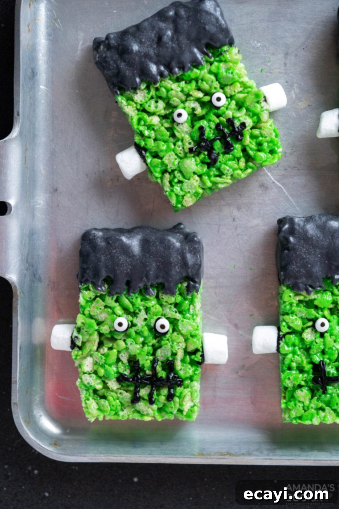 Franken-Crispy Treats 2 Frankenstein Rice Krispie Treats on a pan