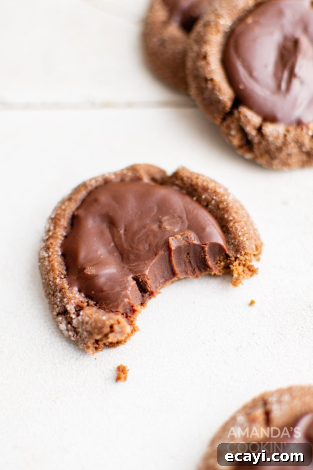 Irresistible Chocolate Thumbprint Delights 6 Chocolate Thumbprint Cookie with a bite out of it