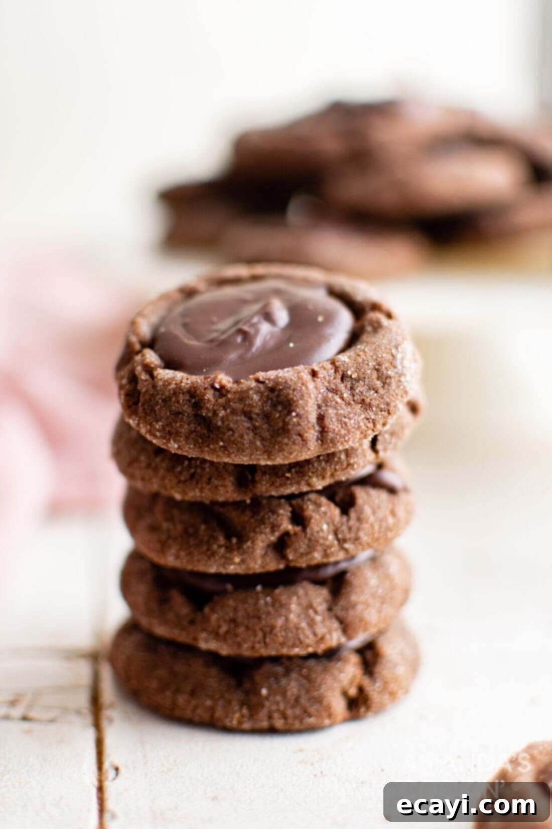 Irresistible Chocolate Thumbprint Delights 3 stack of Chocolate Thumbprint Cookies