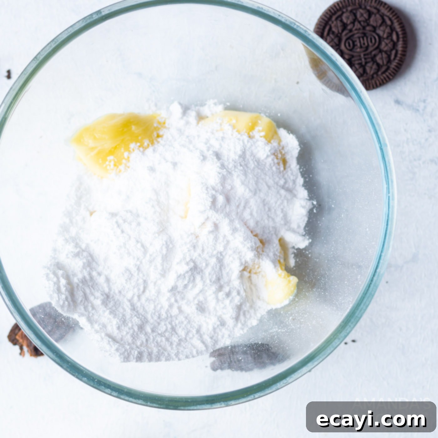 Ultimate Oreo Cupcakes 11 softened butter being mixed with powdered sugar for frosting