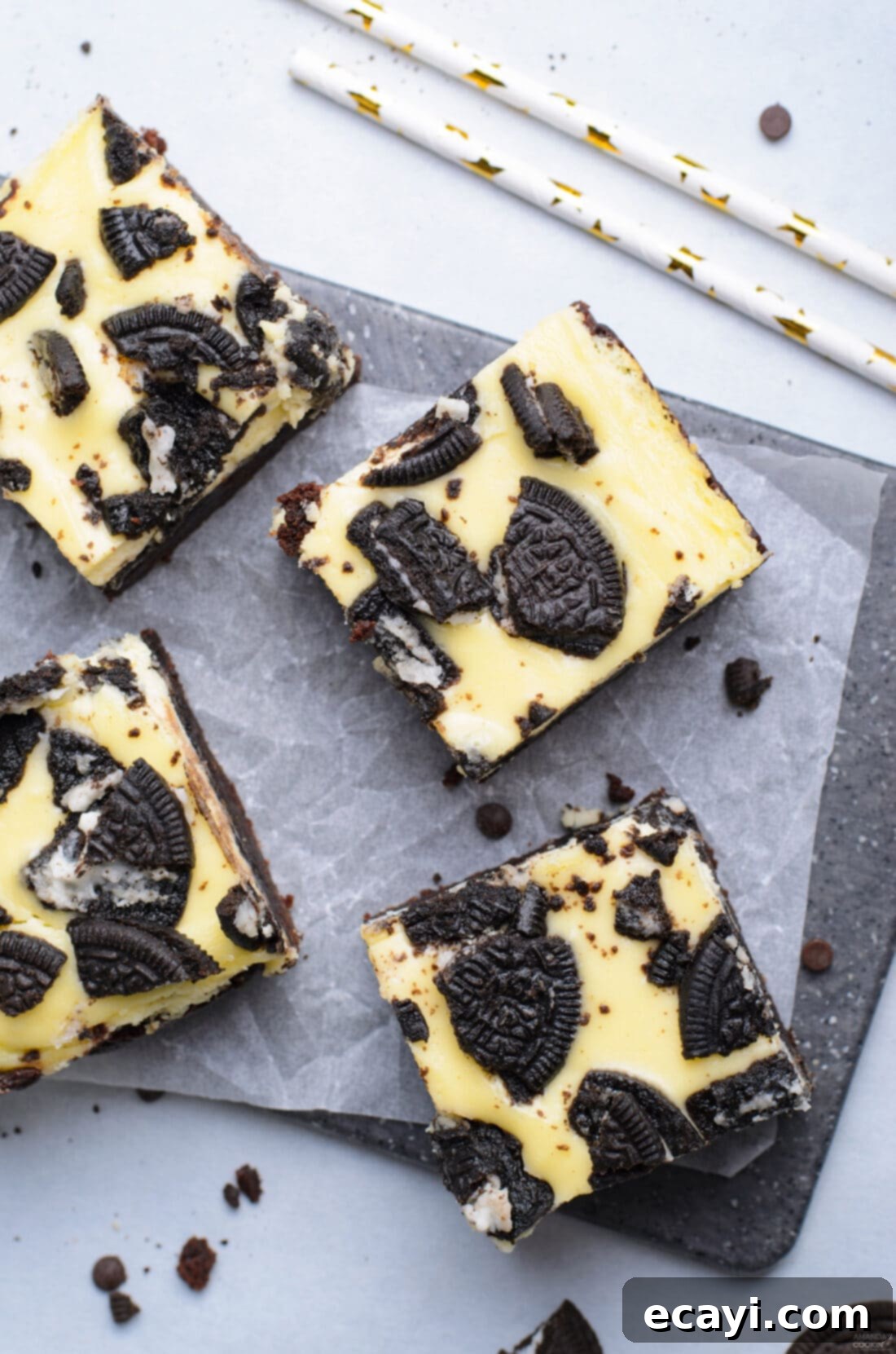 Decadent Oreo Cheesecake Brownies 3 An inviting overhead view of a pan of freshly baked Oreo Cheesecake Brownies, ready to be sliced, highlighting their layered perfection.