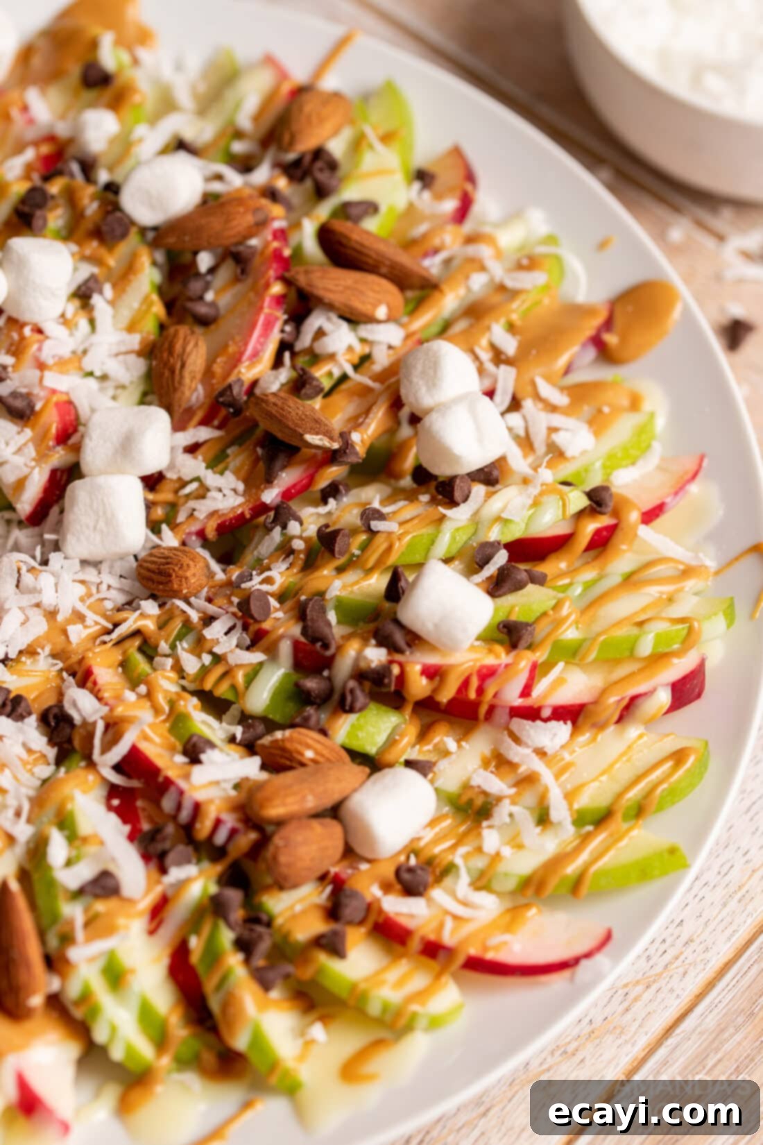 Orchard Nachos 7 Apple Nachos on a rustic wooden board, ready to be served