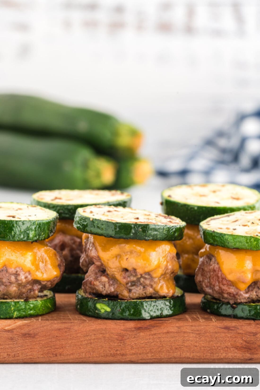 Mini Zucchini Bites 3 Stacked Zucchini Sliders with melted cheese