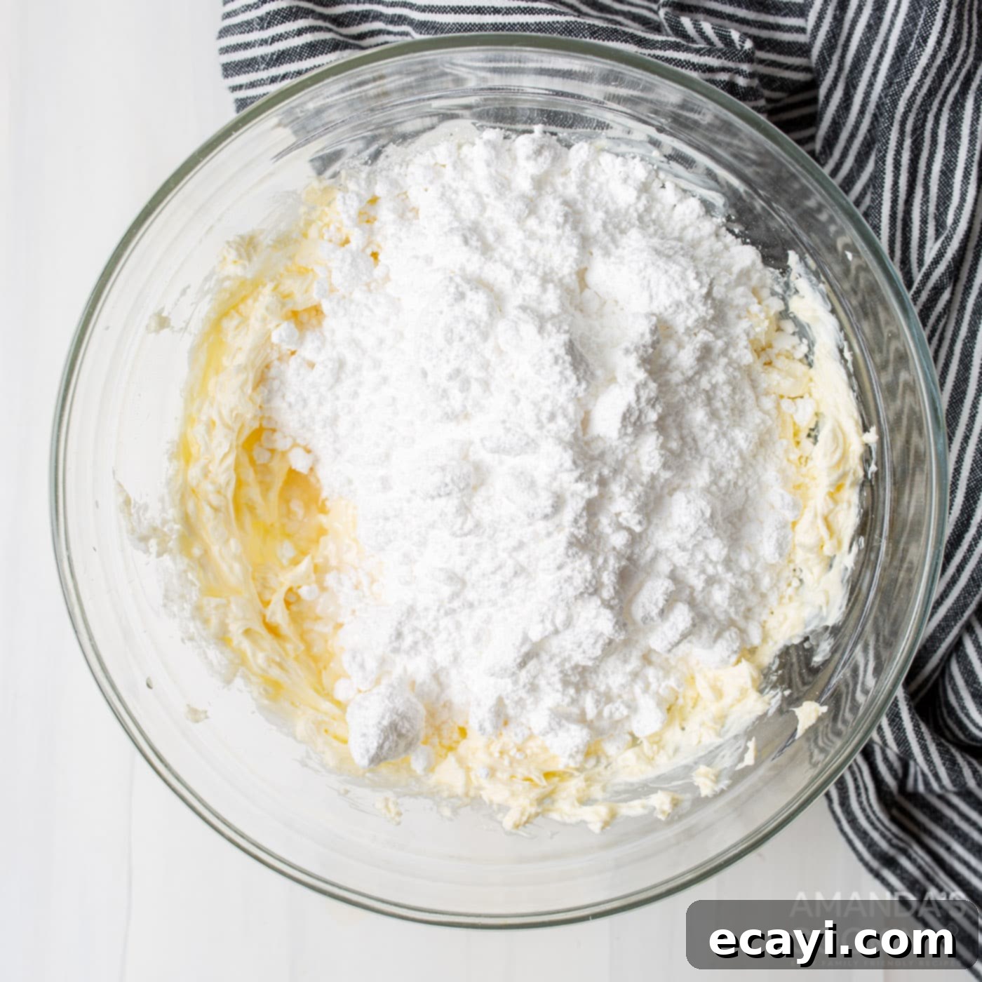 The King's Confection 6 cream cheese and butter with  powdered sugar in a bowl