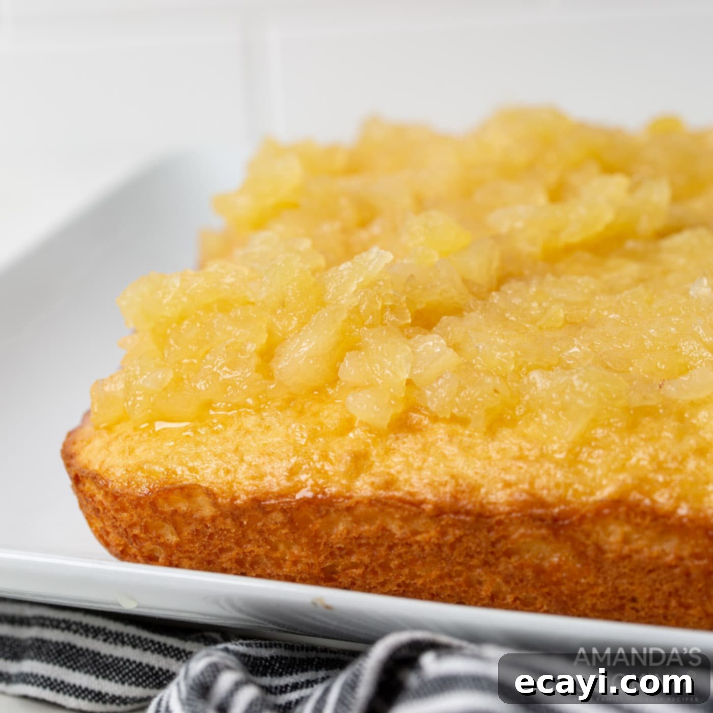 The King's Confection 9 pineapple chunks on top of yellow cake