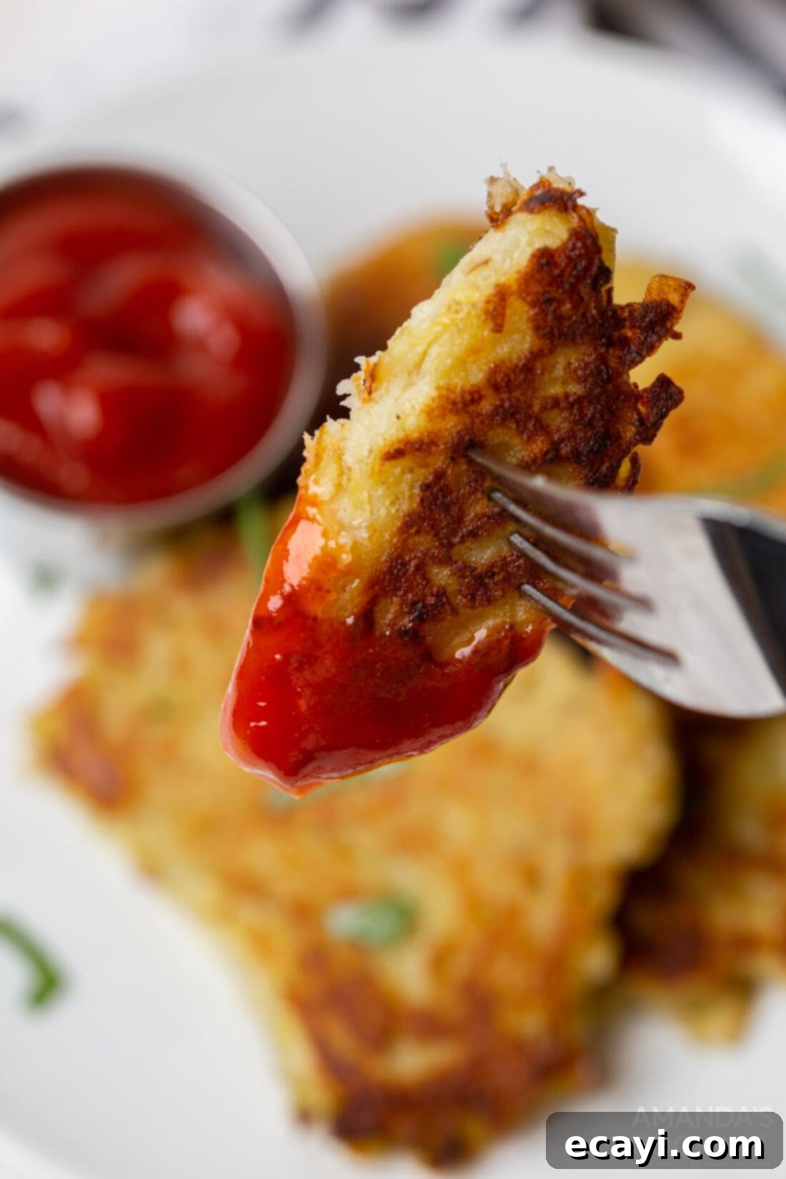 Sizzling Spud Cakes 8 Potato Pancake dipped in ketchup