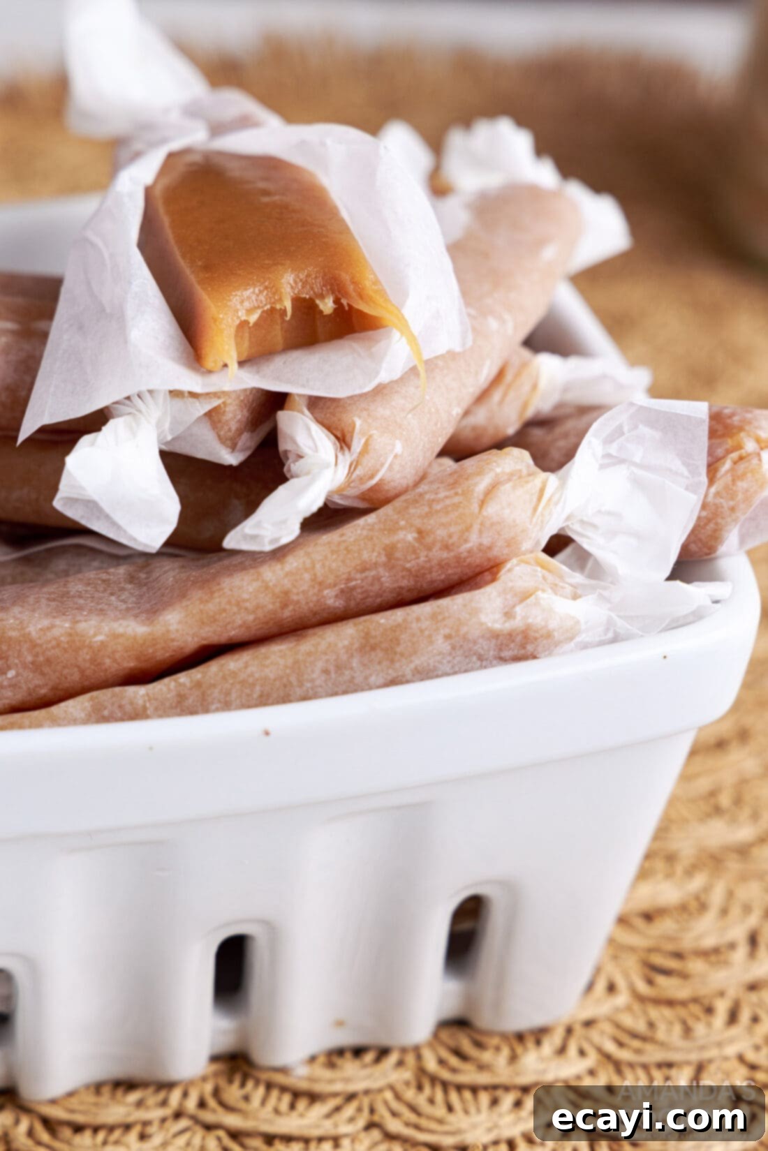Microwave's Golden Delight 2 Microwave Caramels in a white dish, unwrapped and ready to eat