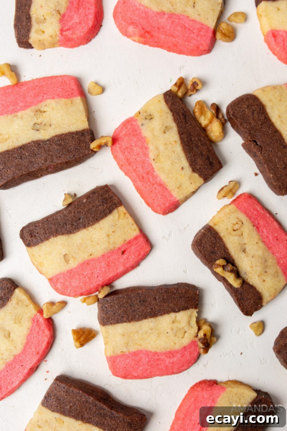 Colorful Neapolitan Delights 2 neapolitan cookies on a white board