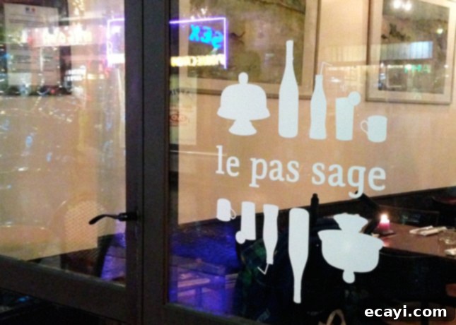 Café Le Pas Sage: Parisian Charm on Rue Saint-Denis Café Le Pas Sage: A chic wine bar at the entrance of Passage du Grand Cerf, Paris