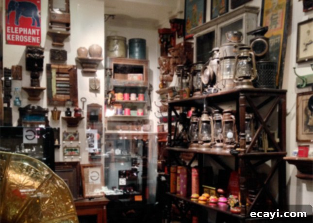 Rickshaw: Treasures from Around the World Inside Rickshaw, offering vintage and imported objects in Passage du Grand Cerf