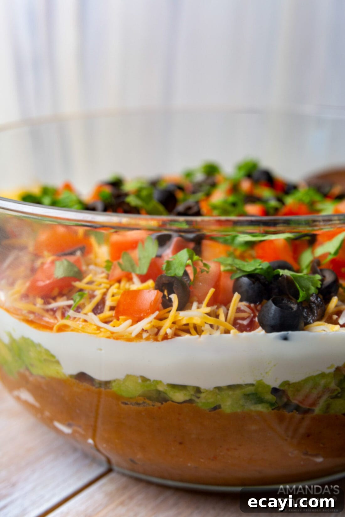 Ultimate Seven Layer Taco Dip 2 bowl of 7 Layer Taco Dip