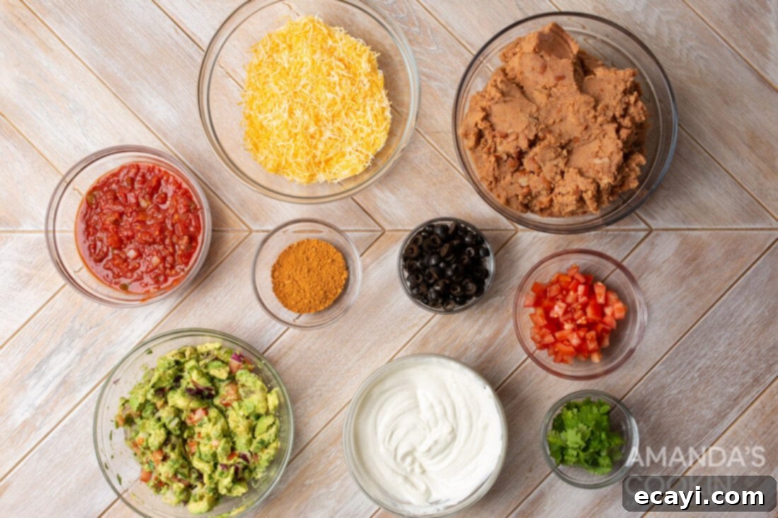 Ultimate Seven Layer Taco Dip 4 ingredients for 7 Layer Taco Dip