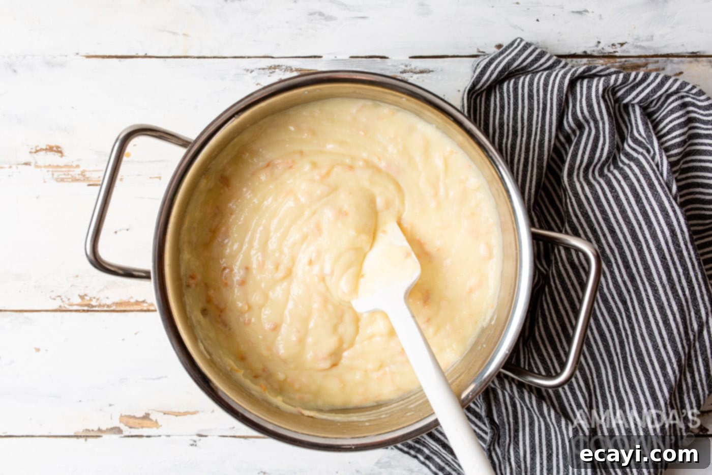 Velvet Coconut Cream Pie 7 rubber spatula stirring coconut custard