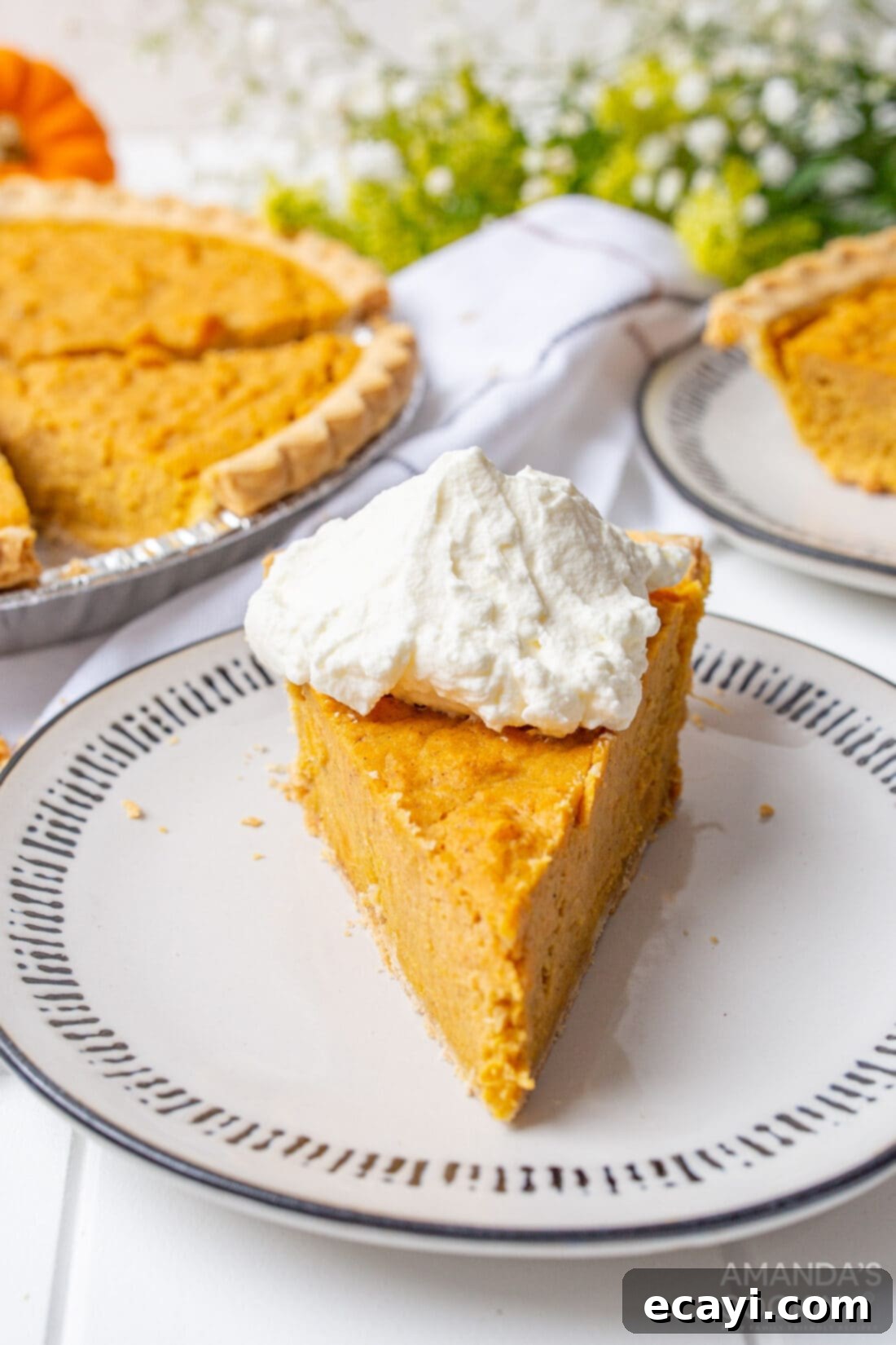 Classic Sweet Potato Pie 2 slice of Sweet Potato Pie with whipped cream
