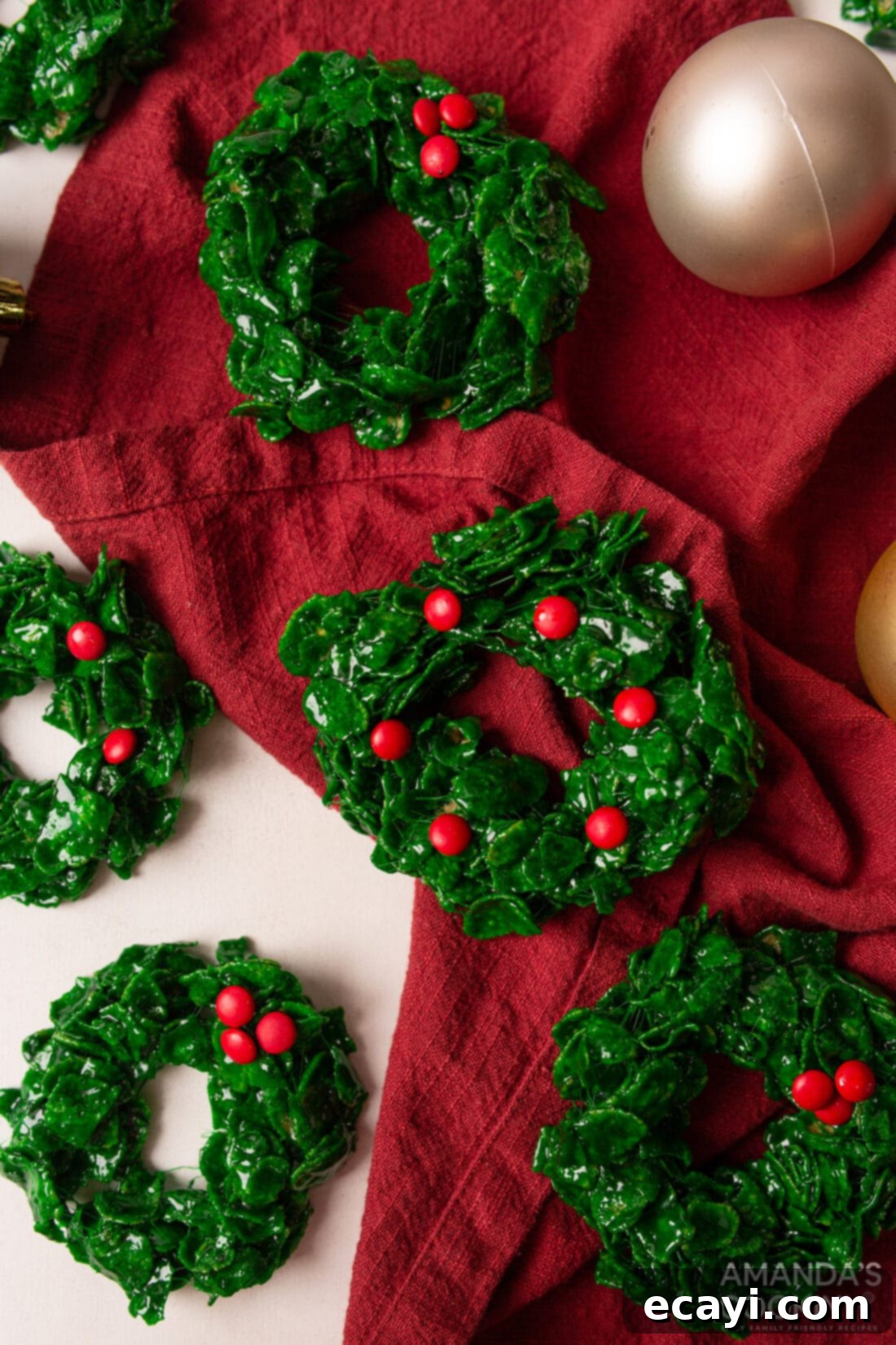 Homemade Cornflake Christmas Wreaths 2 Cornflake Christmas Wreath Cookies with a red linen