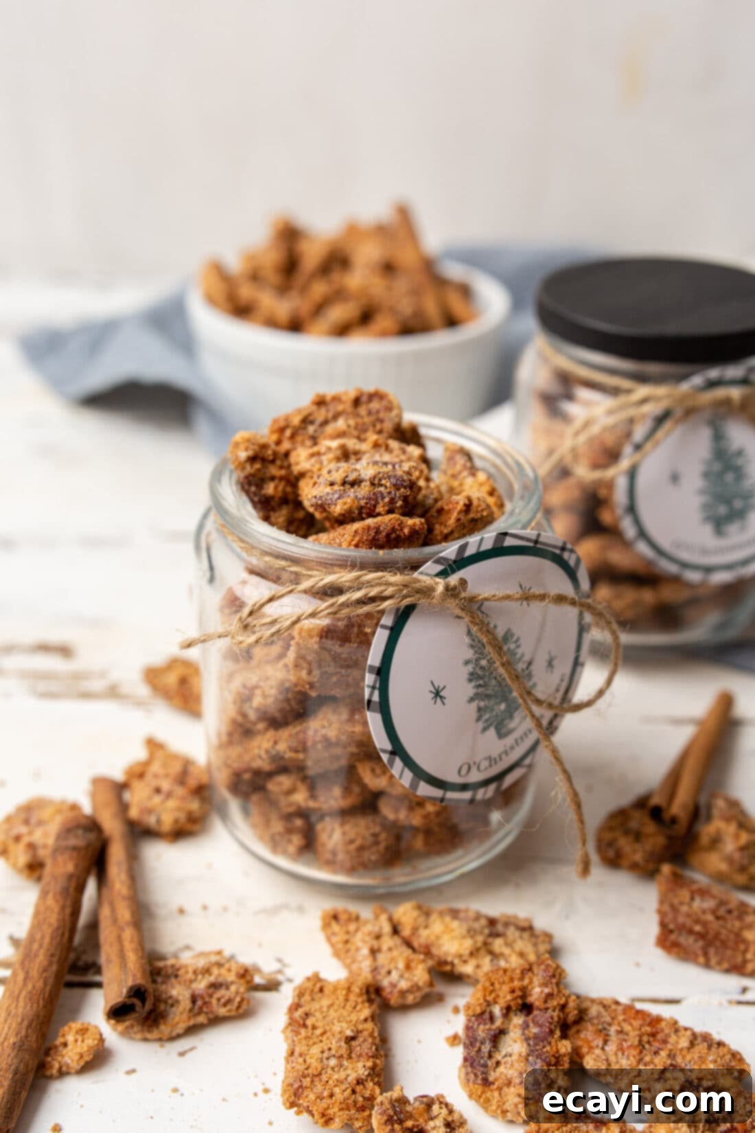Sweet Pecan Delights 2 Jar filled with golden brown homemade candied pecans, ready for gifting
