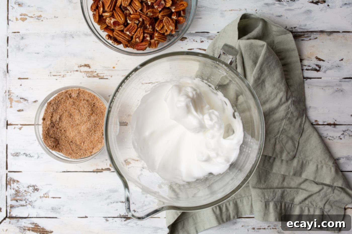 Sweet Pecan Delights 6 Fluffy whipped egg whites with water and vanilla extract in a stand mixer bowl