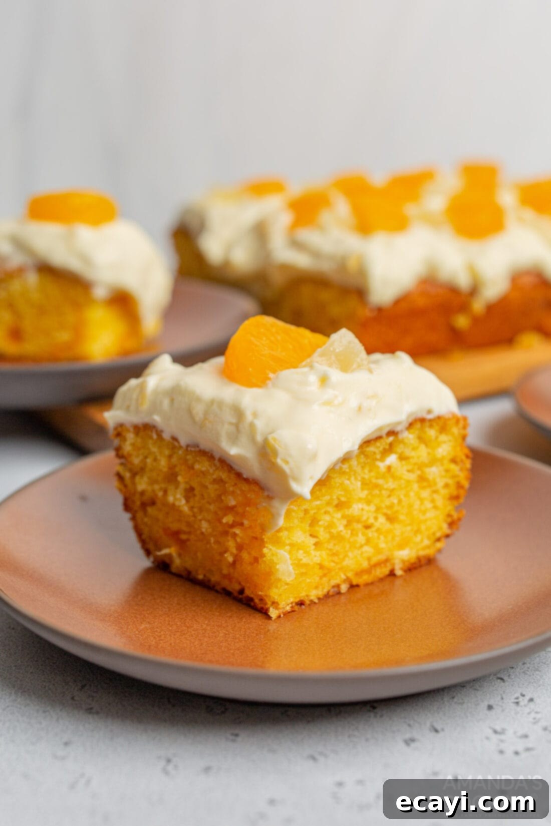 Sunshine Pineapple Orange Cake 9 Close-up of the delicious Orange Pineapple Cake with a fork taking a bite