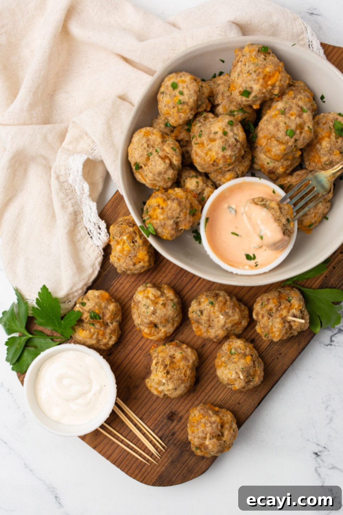 Savory Sausage Bites 8 Close-up of baked sausage balls arranged on a serving tray