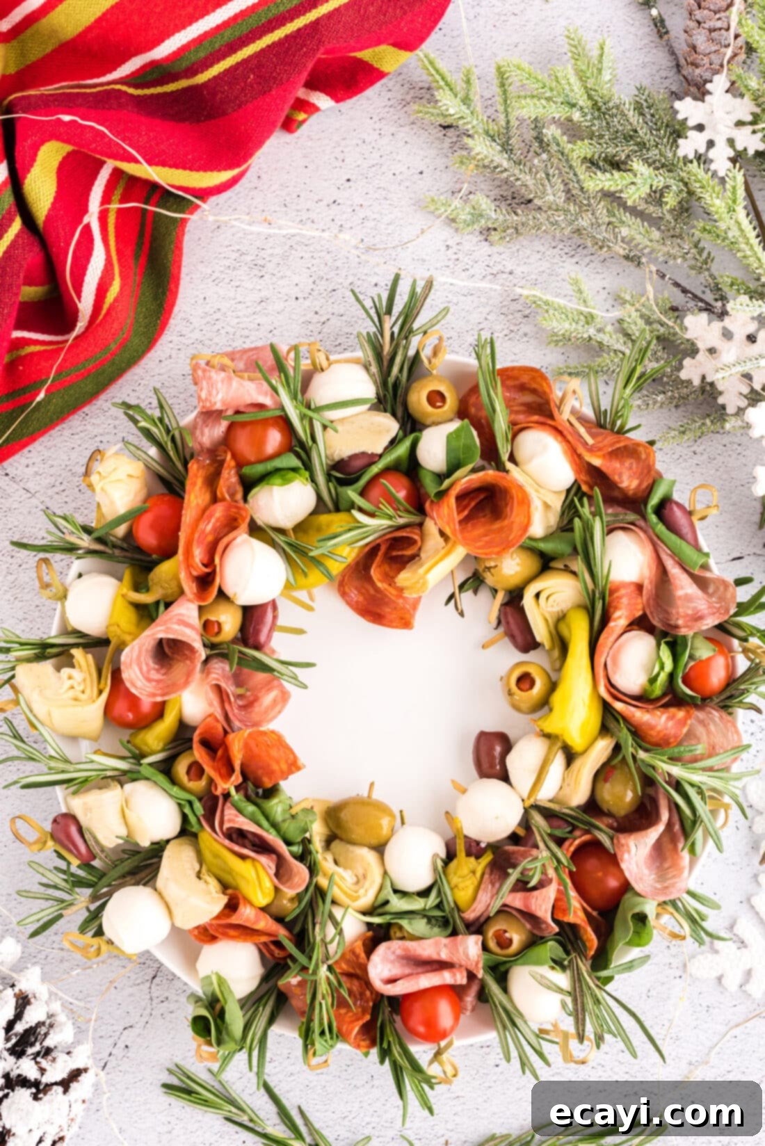Gourmet Grazing Wreath 2 A beautifully arranged Antipasto Wreath on a festive plate, ready to be served as a holiday appetizer.