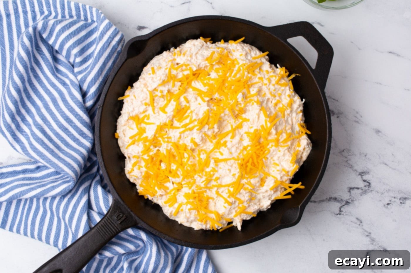 Decadent Crab Dip 7 Crab dip baking in a cast iron skillet