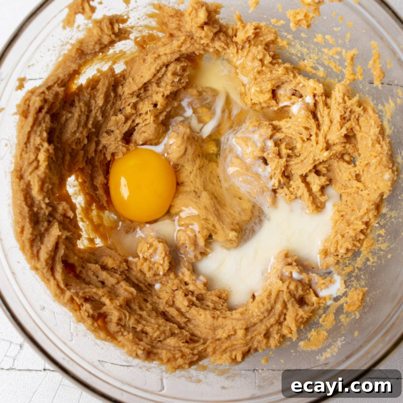 Sweet Christmas Kisses 6 egg, milk, and vanilla extract added to the existing cookie dough mixture in the bowl