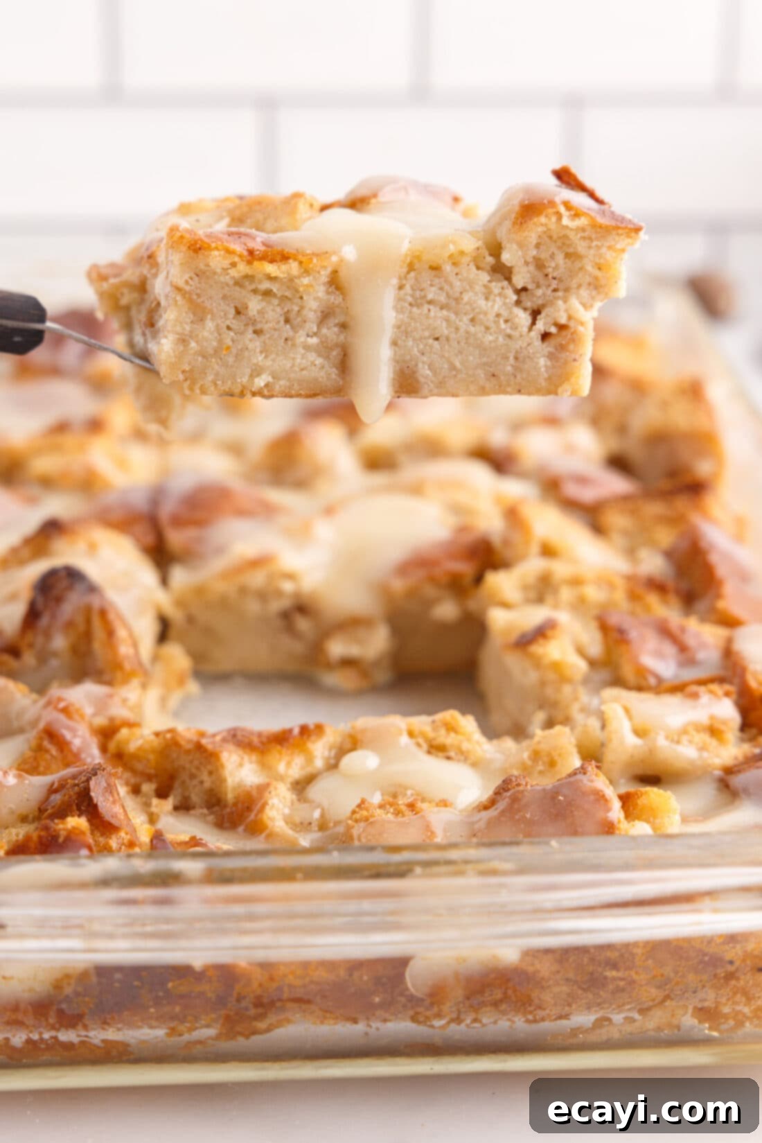 Homemade Bread Pudding Perfection 15 lifting a slice of Bread Pudding
