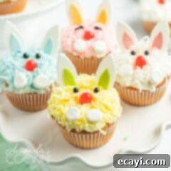 Hoppy Easter Cupcakes 4 A close up of a bunny decorated cupcake with colorful coconut and gum ears.
