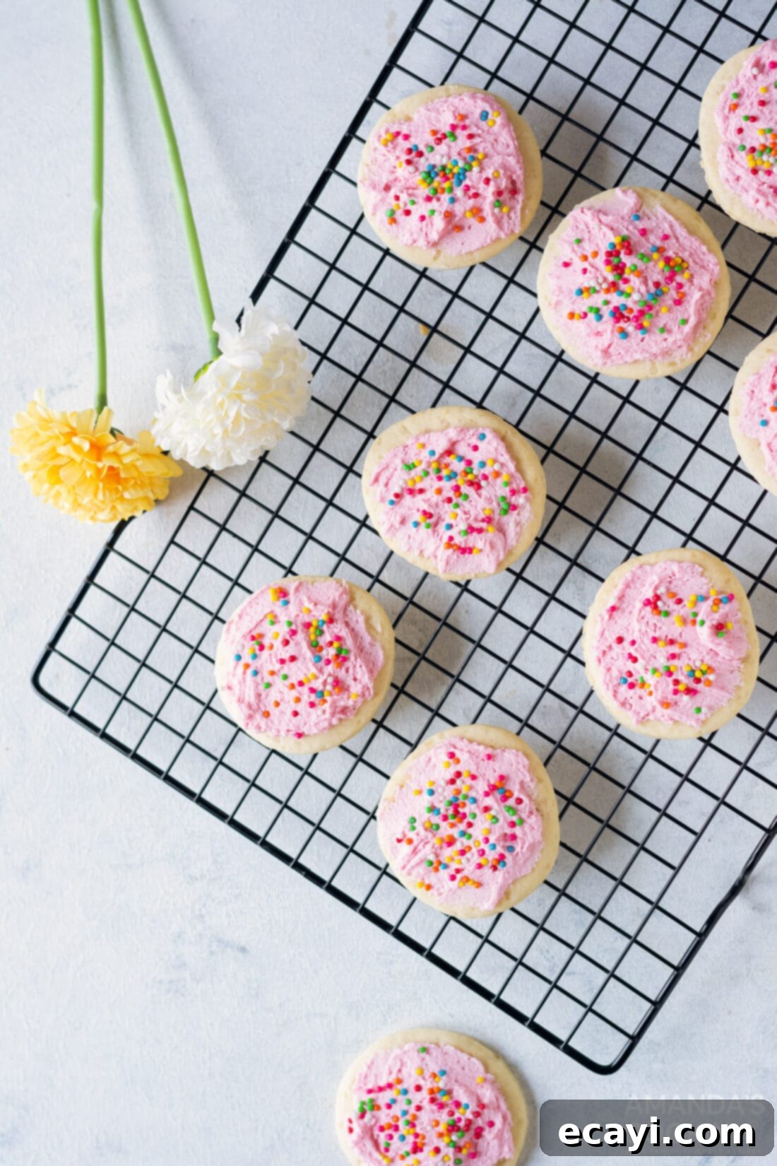 Soft Frosted Lofthouse Cookies 3 Freshly baked Lofthouse cookies cooling on a wire rack