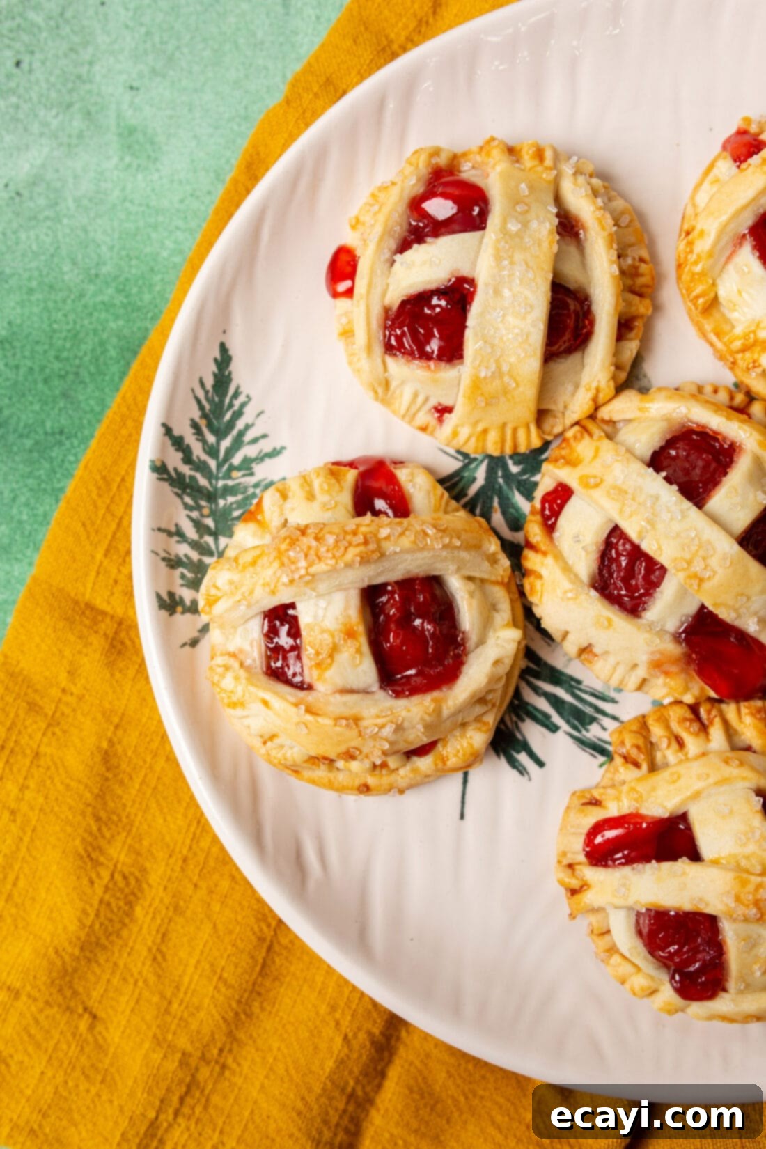 Cherry Pie Bites 2 Plate of golden-brown cherry pie cookies with a lattice design