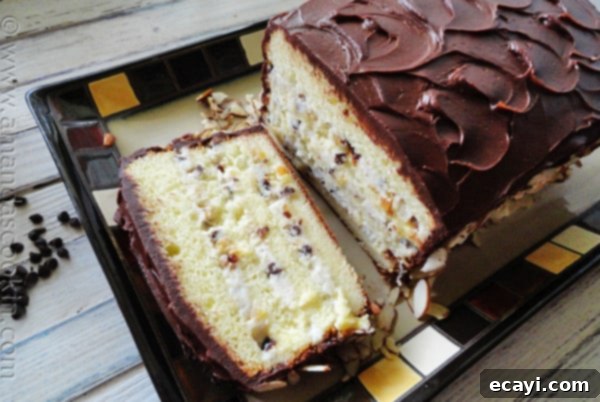 Cassata Cake A perfectly portioned slice of Cassata Cake on a plate, showing the fluffy cake and creamy layers