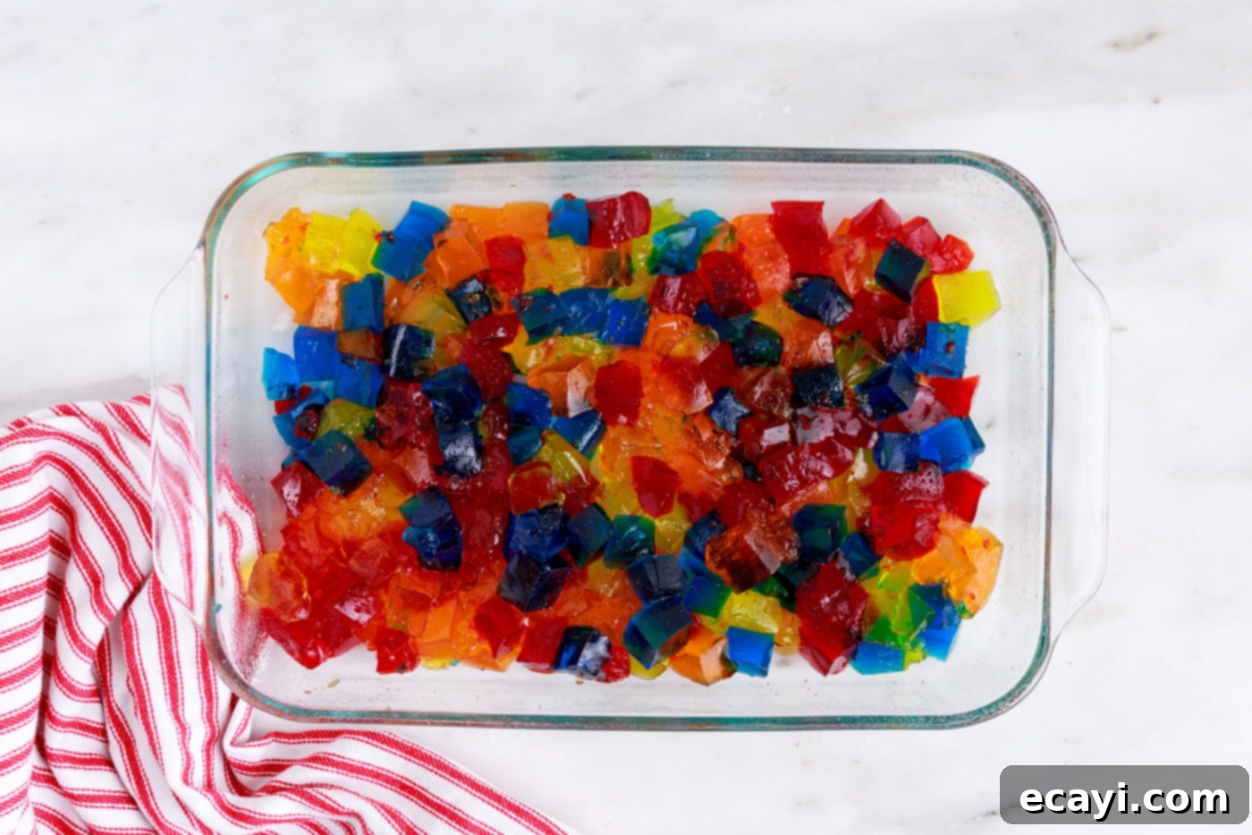 Mosaic Jello Jewels 8 cubed jello pieces in a baking dish