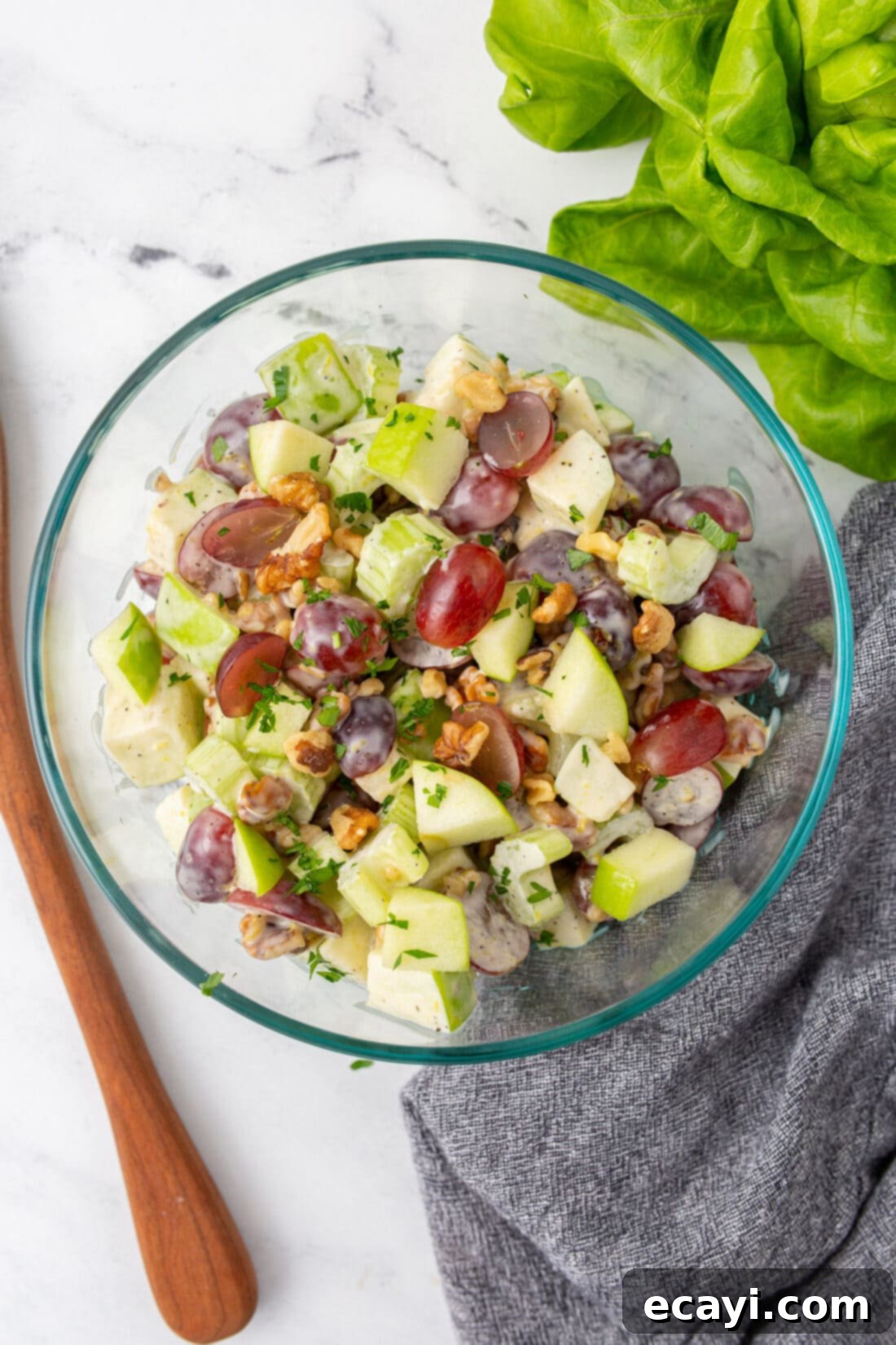 Crisp Apple Walnut Delight 3 A large bowl of freshly prepared Waldorf Salad, with all ingredients perfectly mixed.