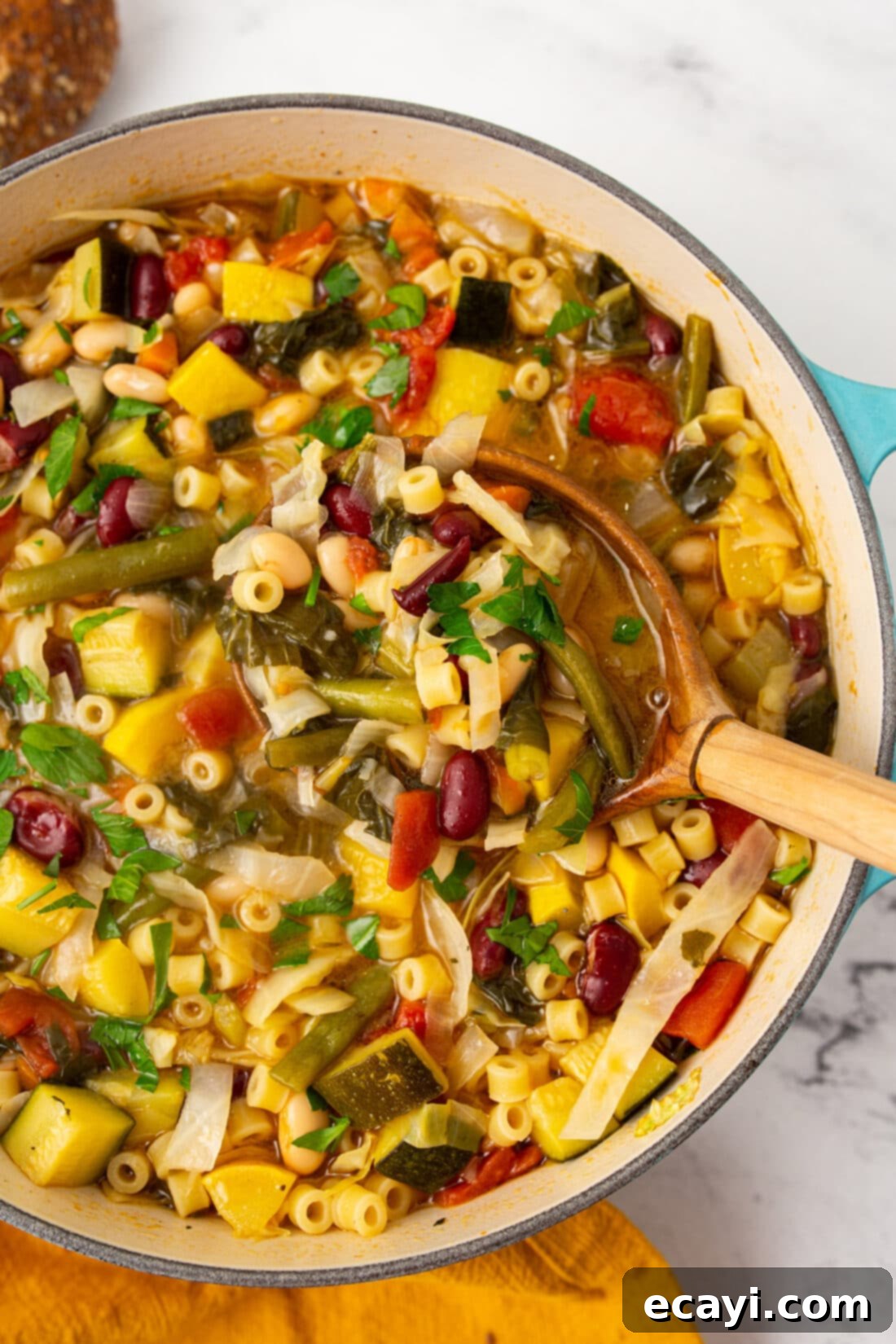 Rustic Italian Minestrone 2 Large pot filled with vibrant Minestrone Soup, showcasing fresh vegetables, pasta, and a rich broth