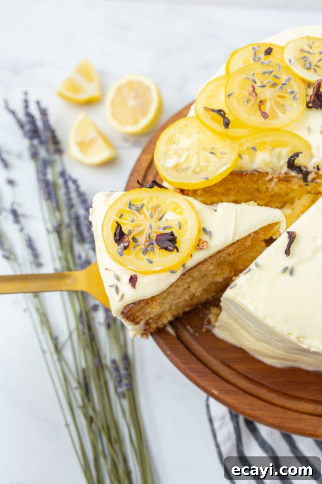 Bright Lemon Bliss 2 removing slice of lemon cake with spatula