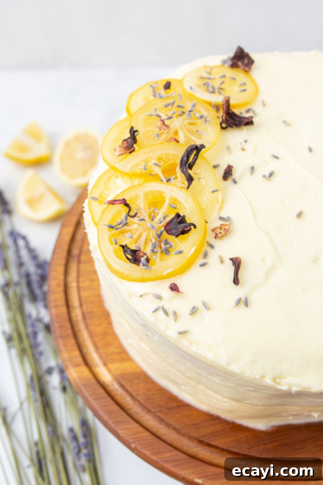 Bright Lemon Bliss 3 lemon cake on a cake plate