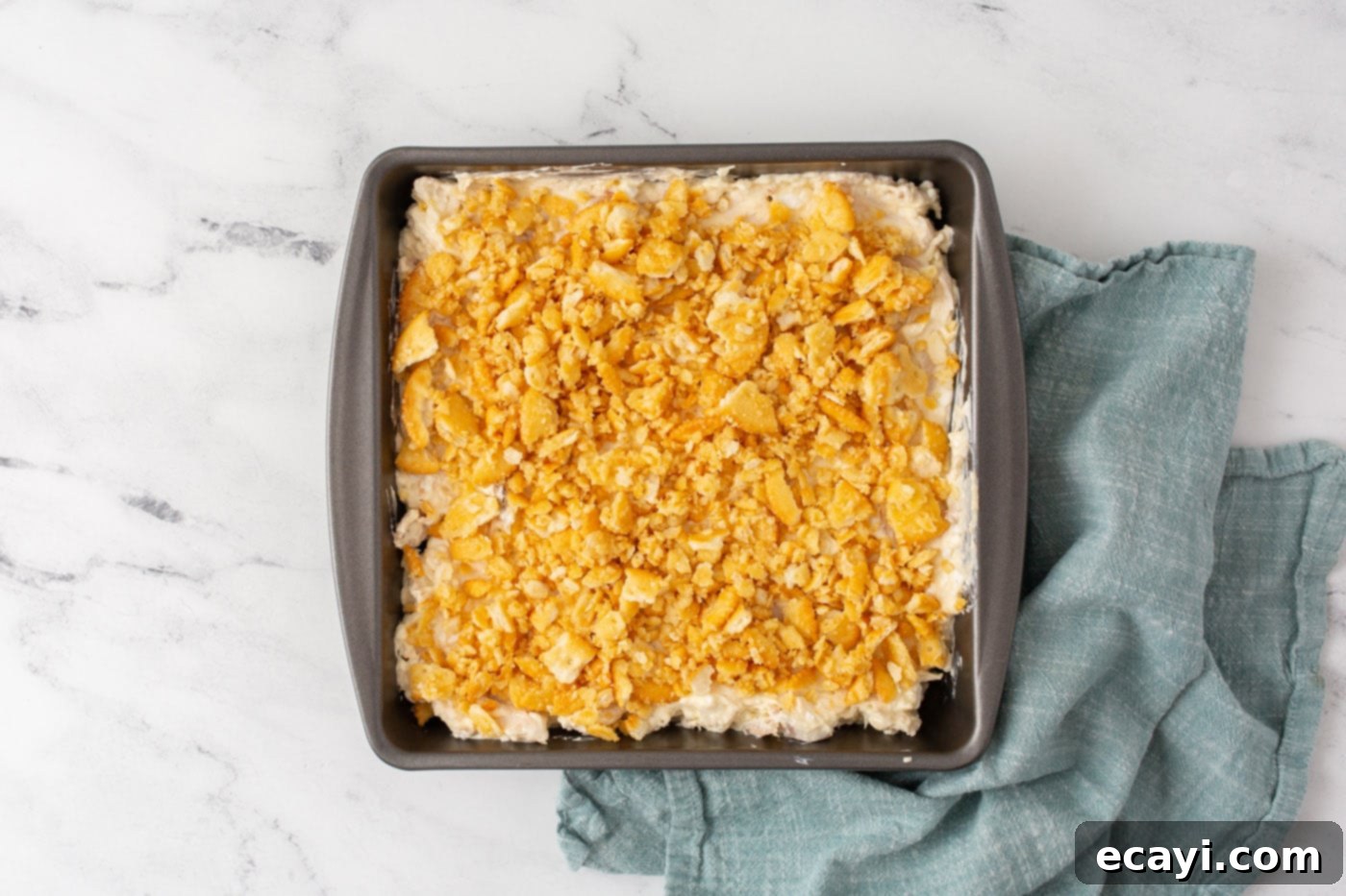 Golden Chicken Casserole 6 Ritz crackers on top of million dollar chicken casserole