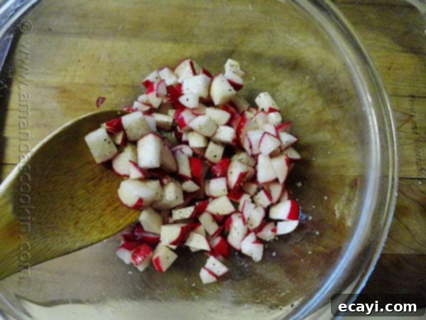 Radish Hash Browns A close up photo of chopped radish in a clear bowl.