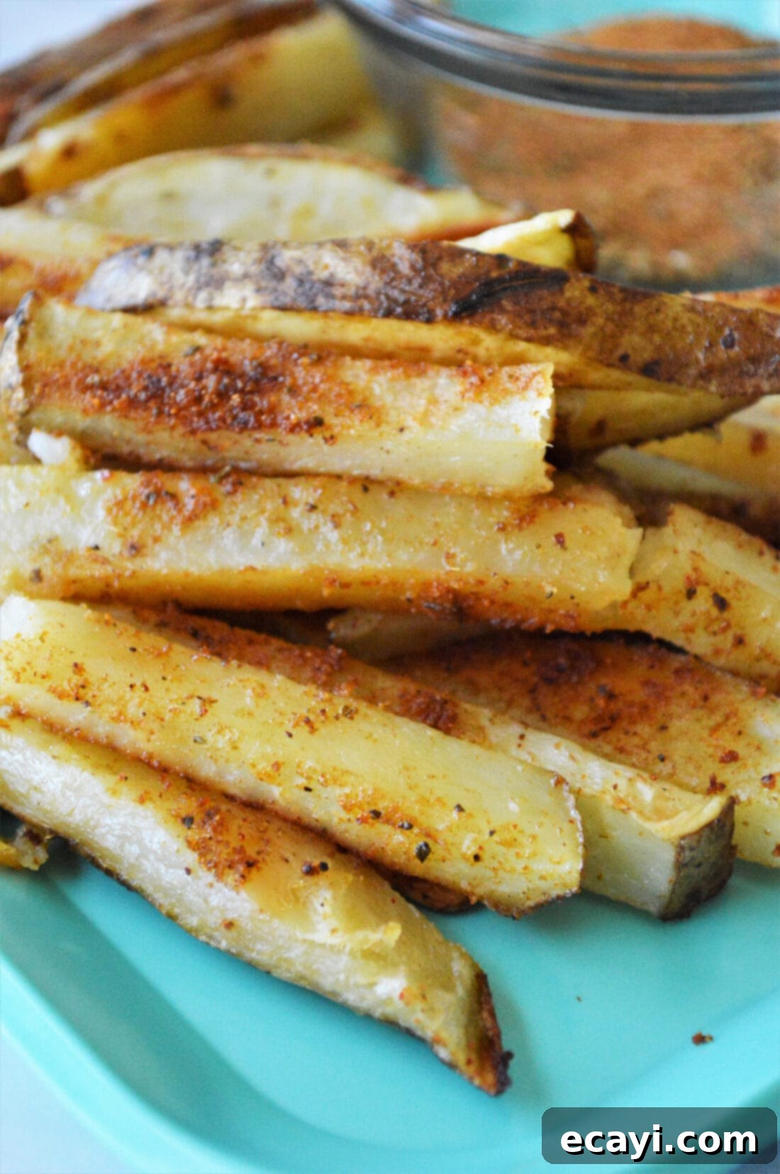 Golden Fry Seasoning 6 Crispy golden French fries generously seasoned with homemade French fry seasoning, inviting a delicious bite.