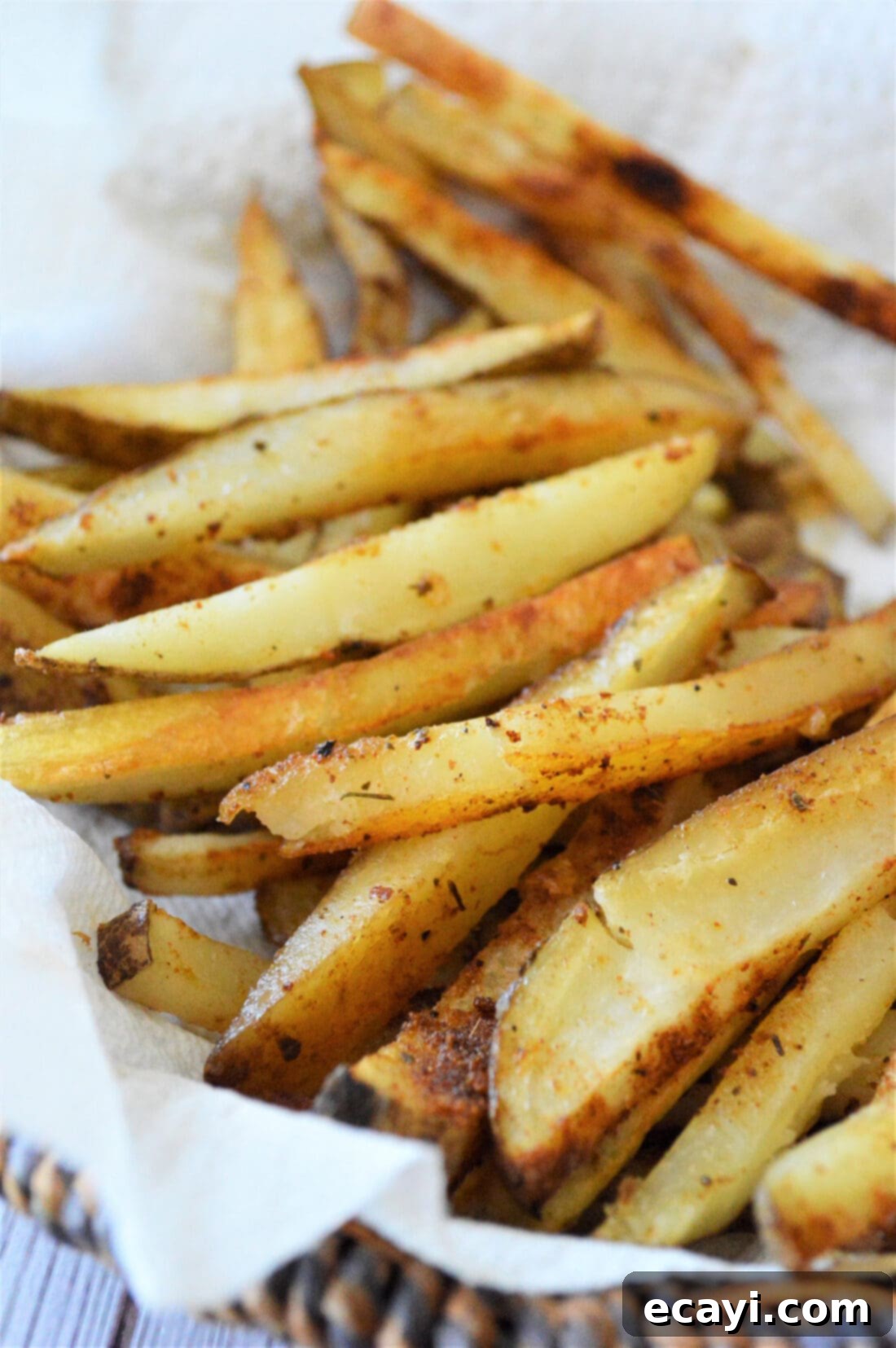 Oven Fries 2 Crispy homemade baked French fries in a rustic basket, ready to be served