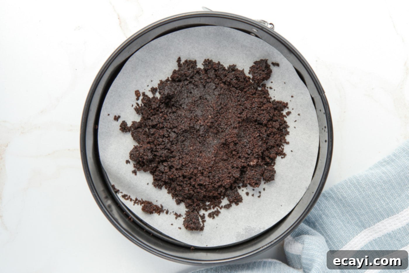 Instant Pot Oreo Cheesecake 5 oreo crumbs in a springform pan