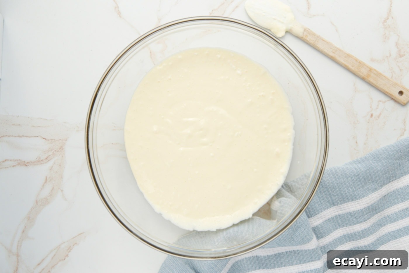 Instant Pot Oreo Cheesecake 7 cheesecake mixture in a mixing bowl