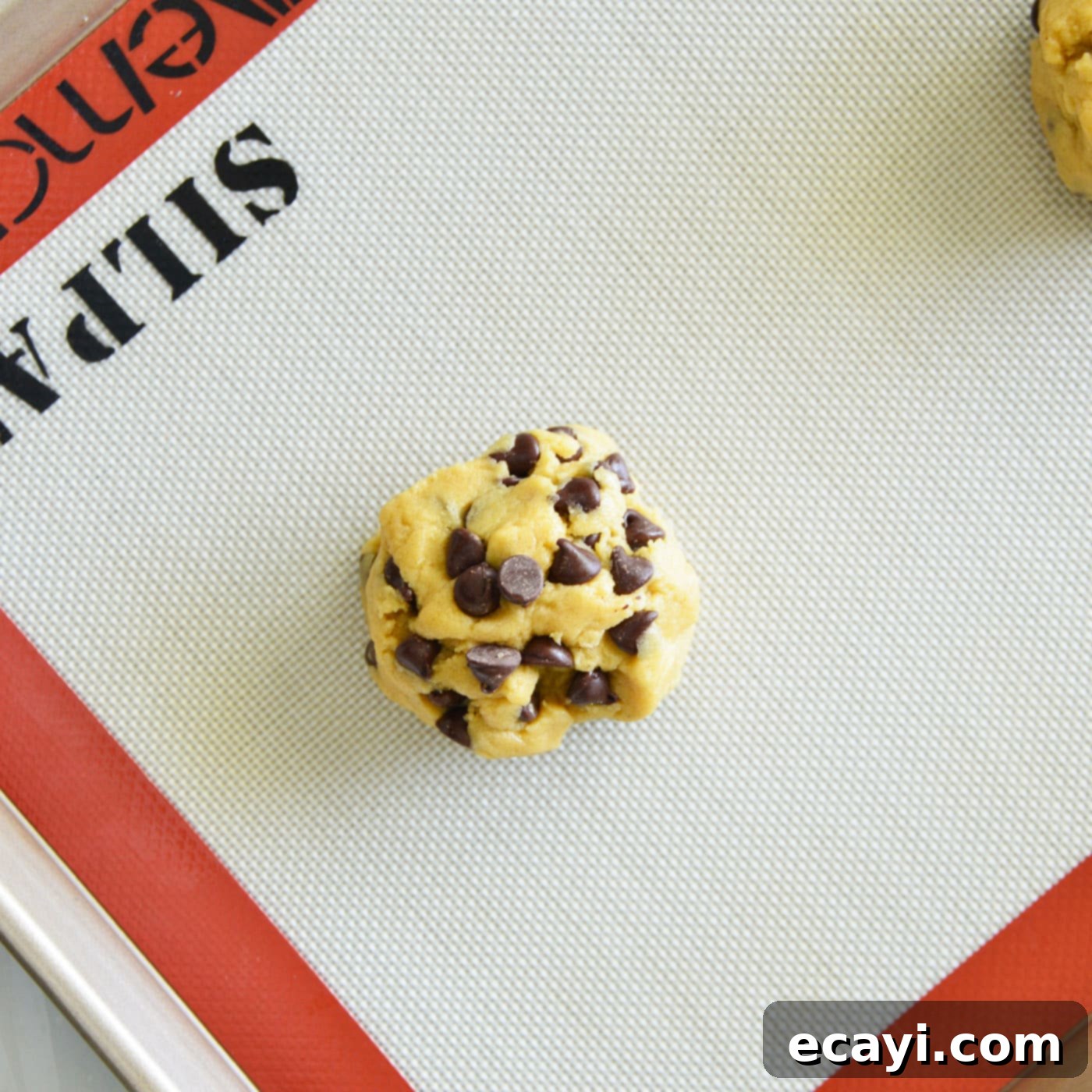 Sweet Duet: Chocolate Chip Cookies 8 chocolate chip cookie dough ball on baking sheet
